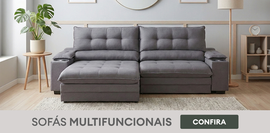 Sofá cinza multifuncional em sala de estar moderna com almofadas e uma gata deitada, decorada com plantas, quadros e móveis de madeira, ideal para conforto e decoração